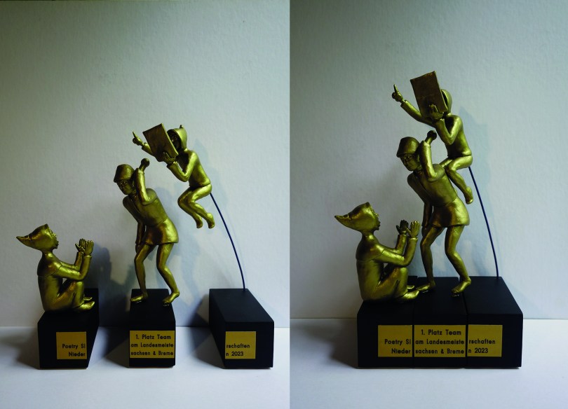 Teilpokal Hildesheimer Huckup (Landesmeisterschaften Poetry Slam), modelliert aus Polymerclay, Acrylfarbe, ca. 20 x 25 x 7 cm